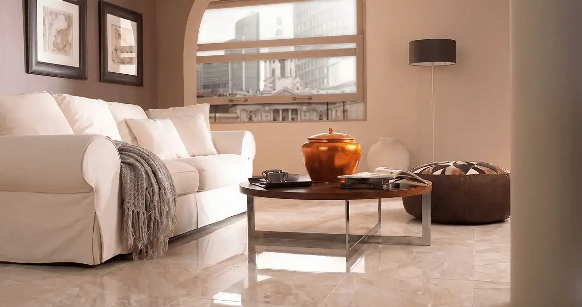 Modern living room with professionally installed marble flooring, a beige sofa, coffee table in Boulder, CO