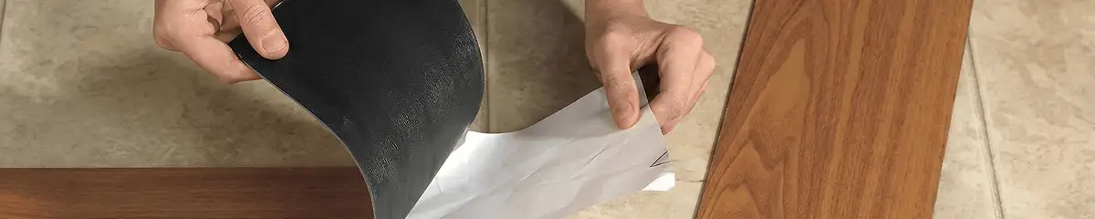 A professional installing vinyl flooring in Boulder, CO