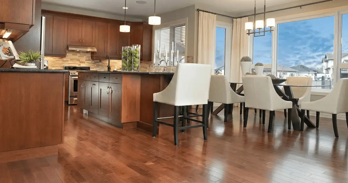 A modern kitchen with professionally installed wood flooring in Boulder, CO